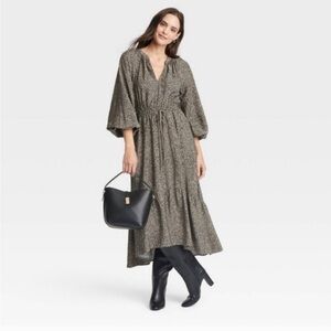 Woman’s balloon sleeve tiered maxi dress